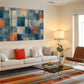 a living room filled with furniture and a painting on the wall