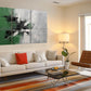 a living room filled with furniture and a painting on the wall