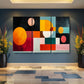 a room with two large paintings on the wall